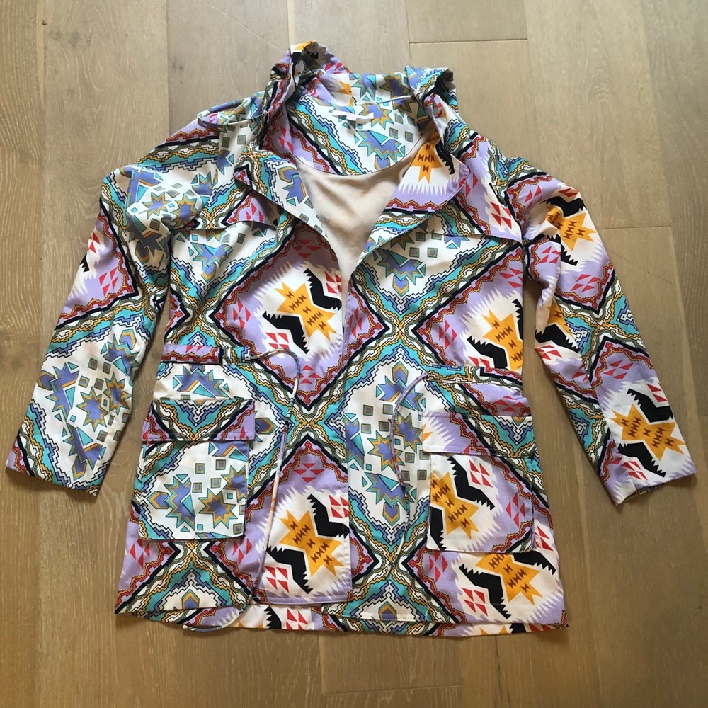 Lightweight Aztec print rain jacket